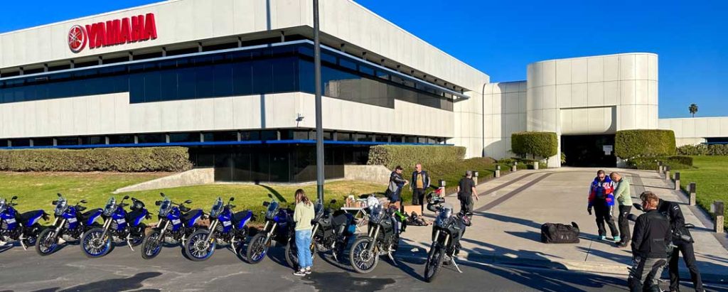Large modern building with Yamaha motorcycles parked in front